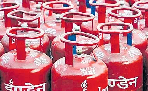 LPG price hiked by Rs 2.94 per cylinder - Sakshi