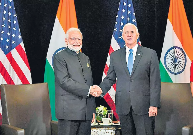 PM Narendra Modi meets US Vice President Mike Pence in Singapore - Sakshi