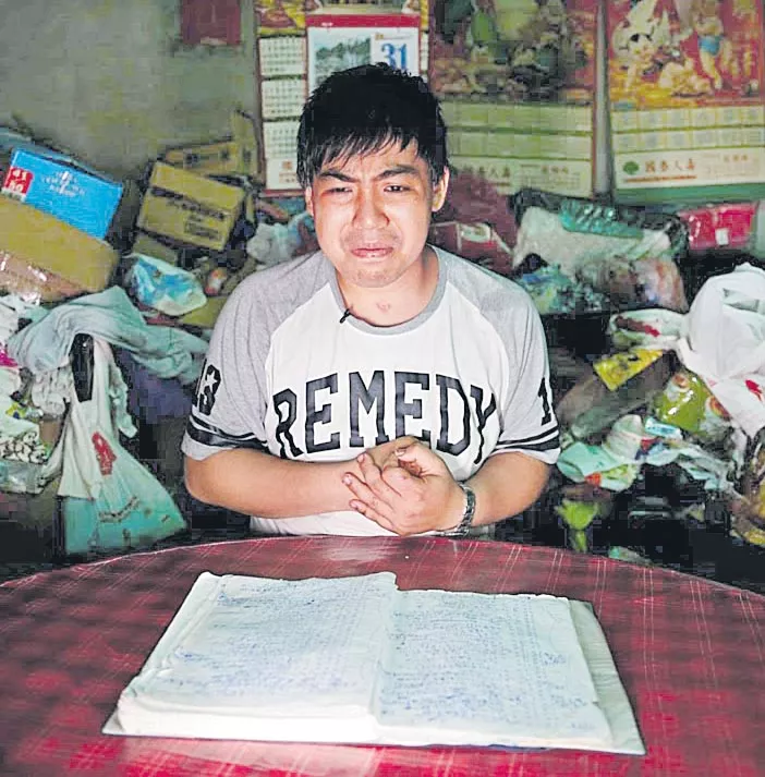 Taiwan's notebook boy commits his memories in writing - Sakshi