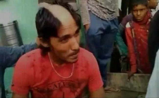 UP Man's Hair Shaved Off For Allegedly Posting Morphed Pics With Girls - Sakshi