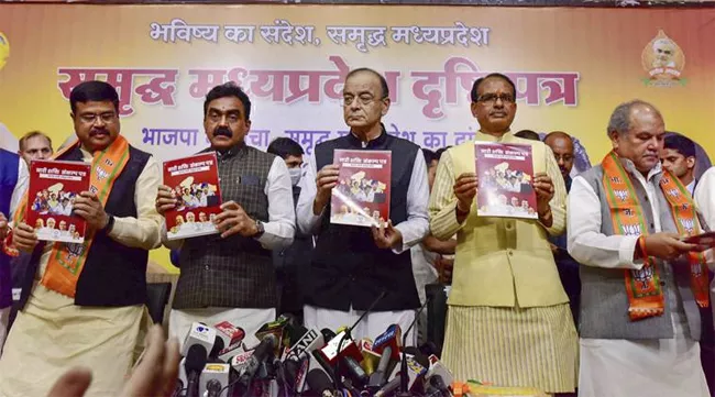 Arun Jaitley and Shivraj Singh Chauhan Released Madhya Pradesh Manifesto - Sakshi