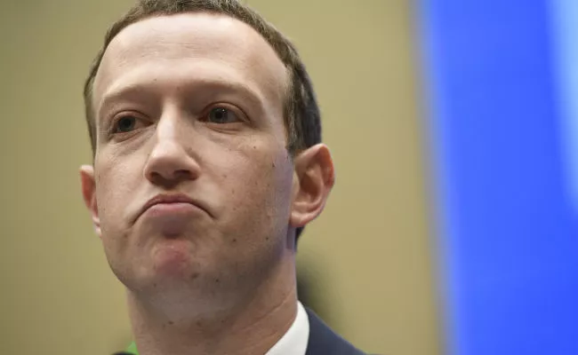 Facebook investors want Zuckerberg to step down as company's chairman following report - Sakshi