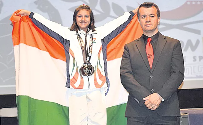 Silver In Karate Purvi Sharma Win In Athens Games - Sakshi