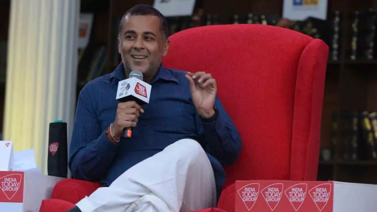 Chetan Bhagat Said MeToo Allegation Against Him Is False - Sakshi