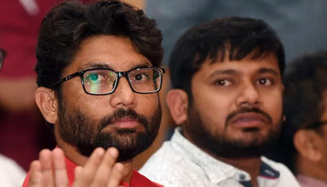 Ink Thrown At Gujarat Lawmaker Jignesh Mevani, Kanhaiya Kumar - Sakshi