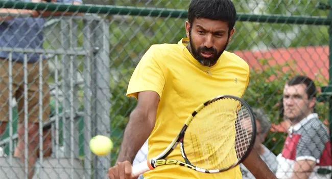  Divij Sharan and Rohan Bopanna exit ATP Paris Masters - Sakshi