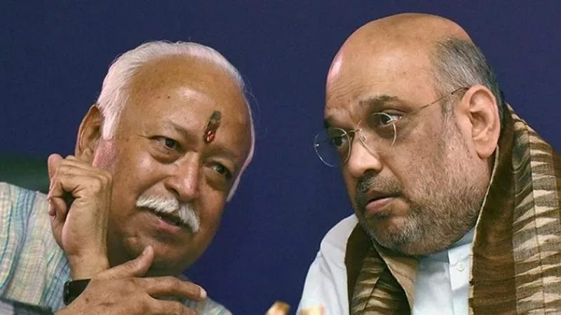 Amit Shah Meets Mohan Bhagwat On Sidelines Of RSS Event - Sakshi