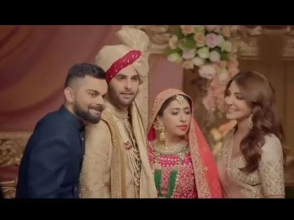 Anushka Sharma and Virat Kohli New Manyavar Ad after Marriage - Sakshi