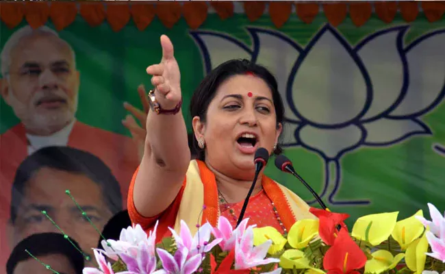 Smriti Irani Respond On Rahul Gandhi Challenge - Sakshi