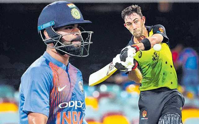  India vs Australia 1st T20: Aus beat Ind by 4 runs in a last-over thriller - Sakshi