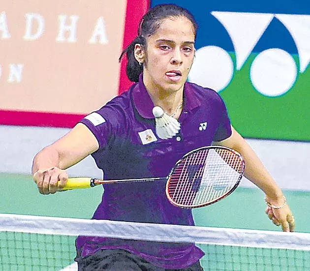 Saina Nehwal, Parupalli Kashyap start with win - Sakshi