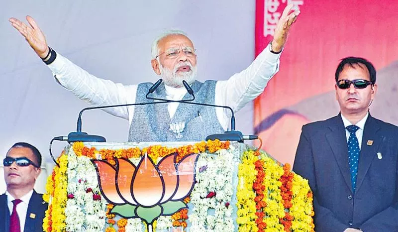 PM Modi attacks Congress for dragging his mother into election debate - Sakshi