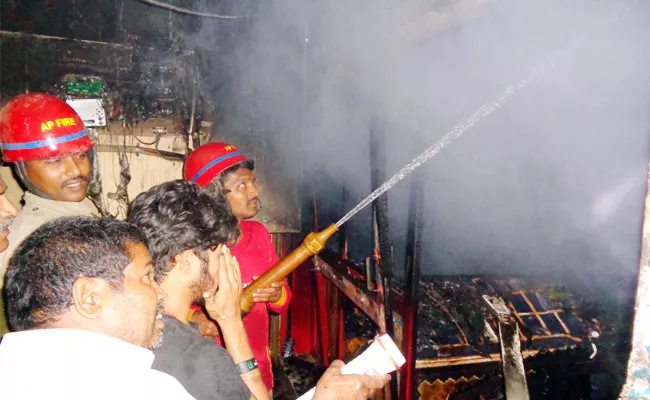 Fire Accident In Cellphone Shop West Godavari - Sakshi