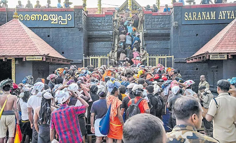 Sabarimala temple opens amid protests - Sakshi