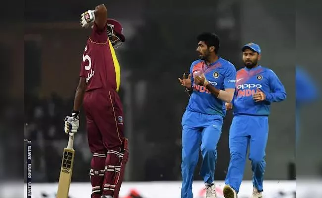 Kieron Pollard On Field Antics Leave Jasprit Bumrah Furious - Sakshi