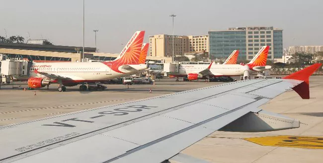 Air India Ground Staff Go On Flash Strike In Mumbai Airport - Sakshi