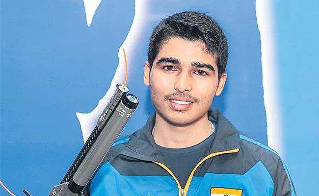 Sourabhs gold at the Asian Shooting Championship - Sakshi