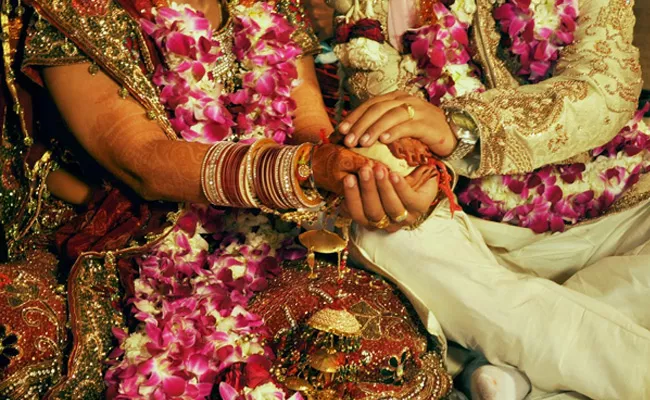 UP Govt Has Banned All Marriages In Prayagraj Between January and March - Sakshi