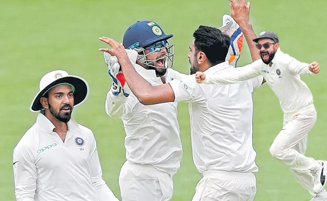 India beat australia in first test match - Sakshi