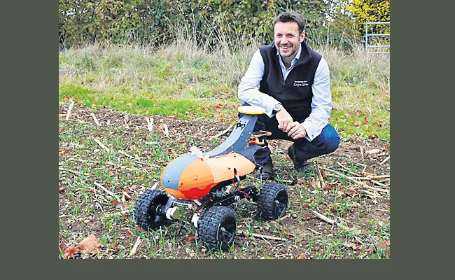 Robot which stretches into the fields so far Placed in the farm - Sakshi