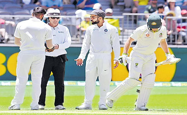 Virat Kohli, Tim Paine resume verbal duel; umpire issues a warning - Sakshi