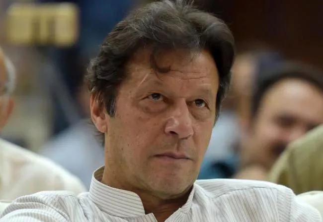 Pakistan Prime Minister Imran Khan takes on Modi on minorities issue - Sakshi