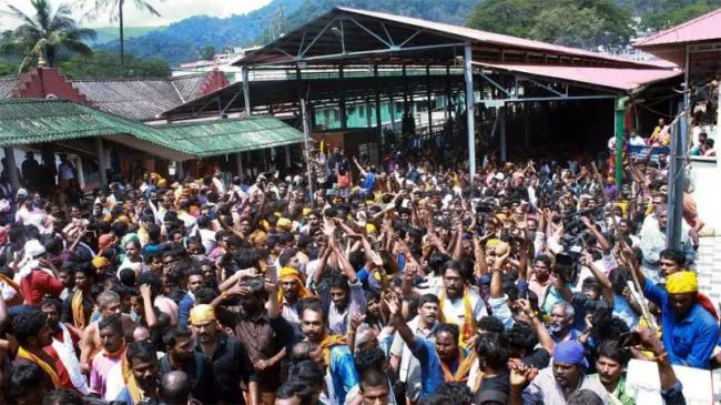 Two Women Stopped Short Of Sabarimala Temple By Protesters - Sakshi