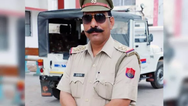 Bulandshahr Cop Subodh Singh Shot Himself, Says BJP MLA - Sakshi