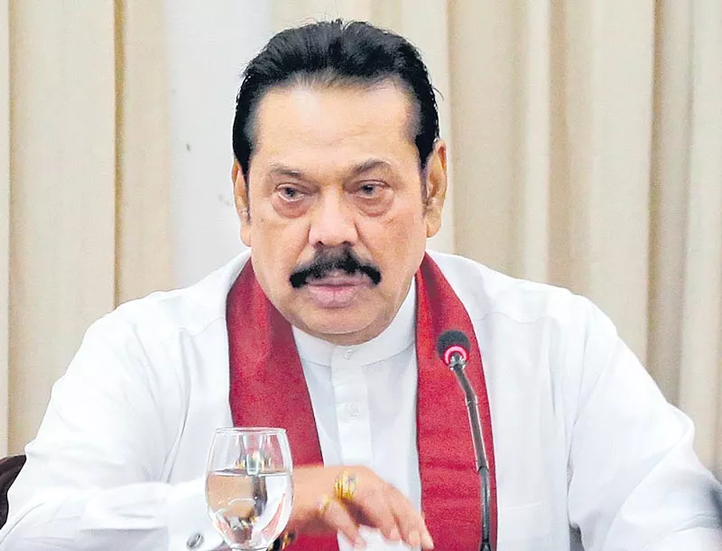 Sri Lanka court bars Mahinda Rajapaksa from acting as PM - Sakshi