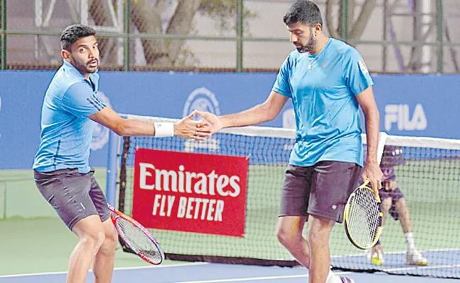 Divij -Bopanna pair enter to quarter final - Sakshi