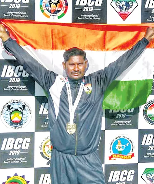 Chandramohan gets Two Medals - Sakshi