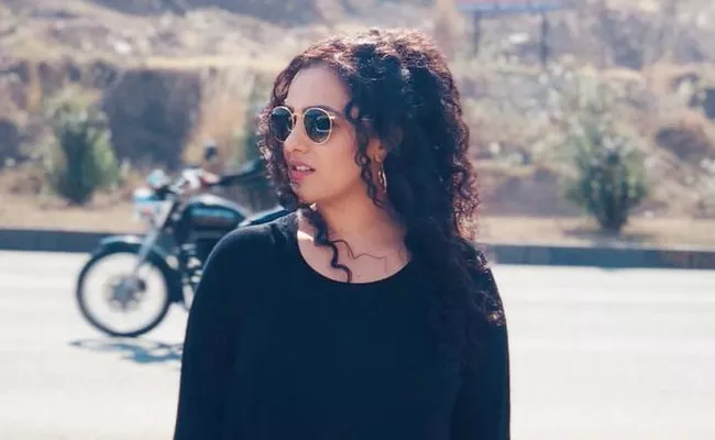 Nithya Menon Highway Shoot Pic Goes Viral - Sakshi