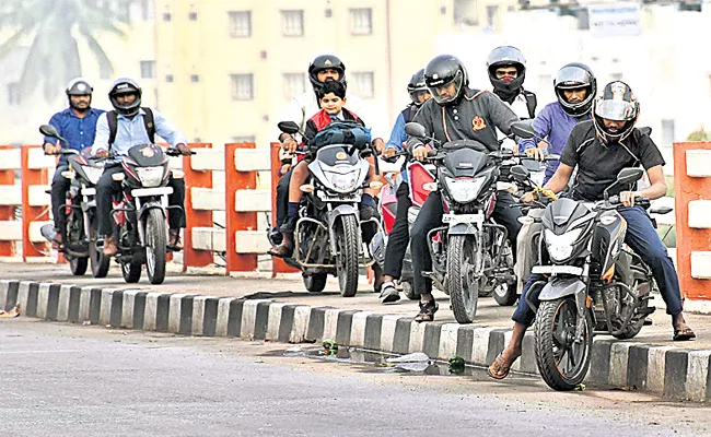 Two Wheelers Riding on Footpaths in Hyderabad - Sakshi