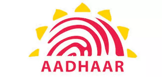 Lok Sabha passes amendments to make Aadhaar voluntary for phones and banking - Sakshi