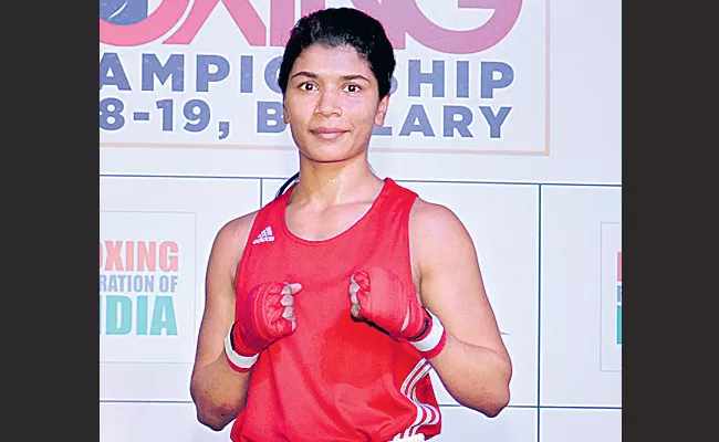 Boxer Nikhat Zareen enter semis - Sakshi