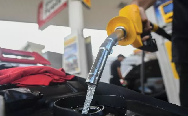 Karnataka Government Hikes Petrol Diesel Tax - Sakshi