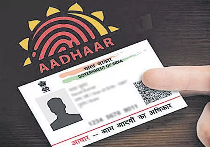 India can save Rs 77,000 crore annually with Aadhaar - Sakshi