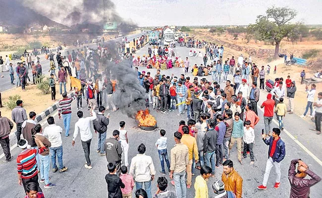 Gujjars agitation for quota turns violent police vehicles torched - Sakshi