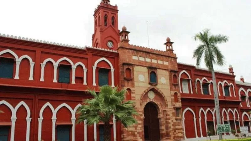 violence in Aligarh Muslim University, treason case - Sakshi