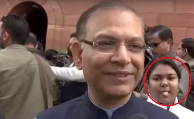 Girl Photobombs Jayant Sinha After Budget Speech and Wins Internet - Sakshi