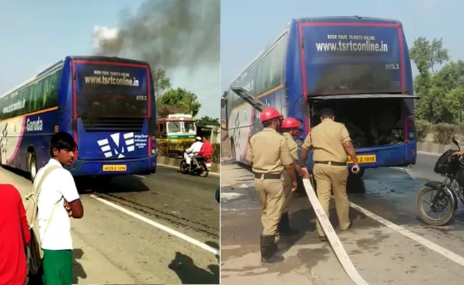 TSRTC garuda bus catches fire in krishna district - Sakshi