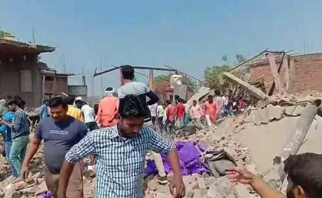 In UP Bhadohi District Explosion At Carpet Factory - Sakshi