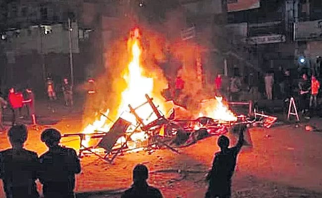 The protest rally turned violent on Sunday - Sakshi