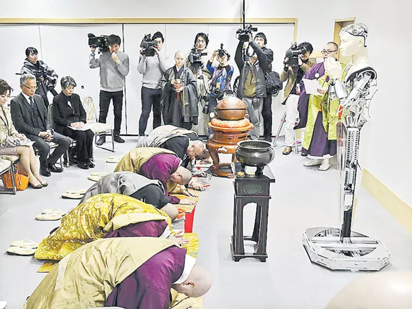 What is the Reason for Buddhist Monks Praising this Robo - Sakshi