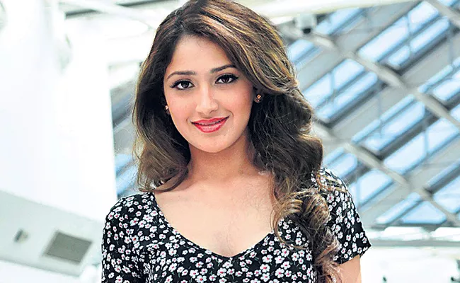 Sayesha Saigal enter to kannada movie - Sakshi