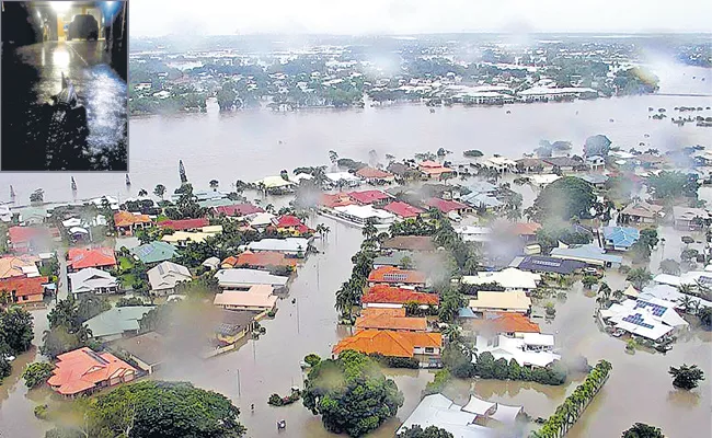 Australia floods as crocodiles, snakes wash up - Sakshi