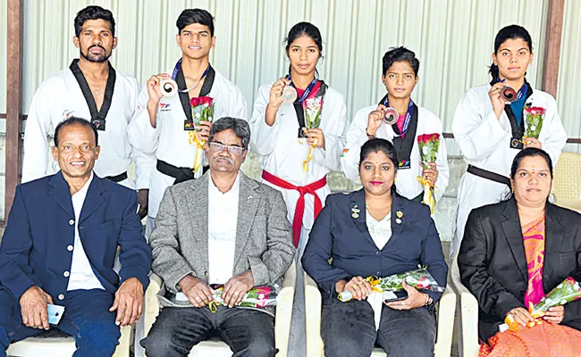 Karan Gets Gold Medal in Taekwondo - Sakshi