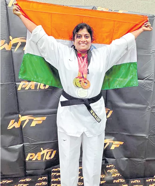 Sandhya reaps rich in world taekwondo championship - Sakshi