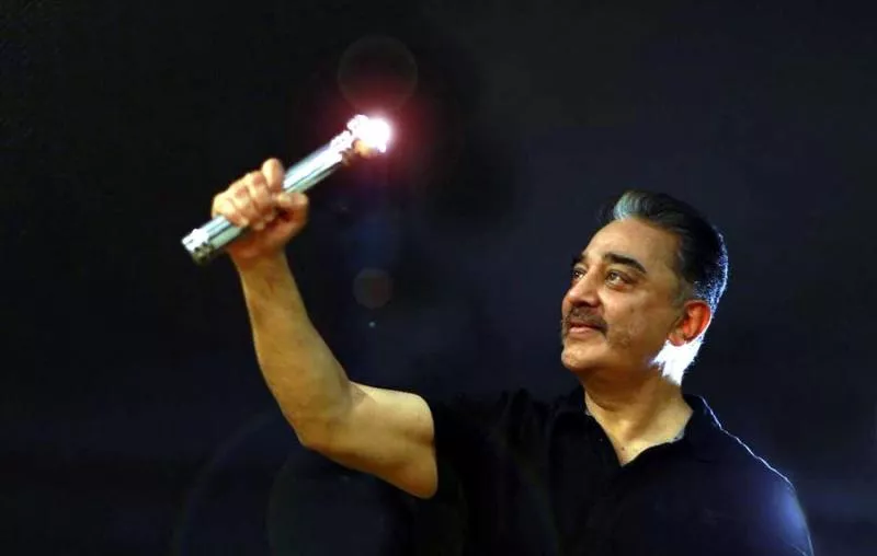 Kamal Haasan's MNM gets battery torch as party symbol - Sakshi