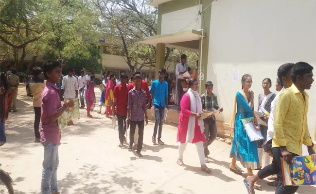 Invigilaters Tension to Student With Cross Checkings - Sakshi